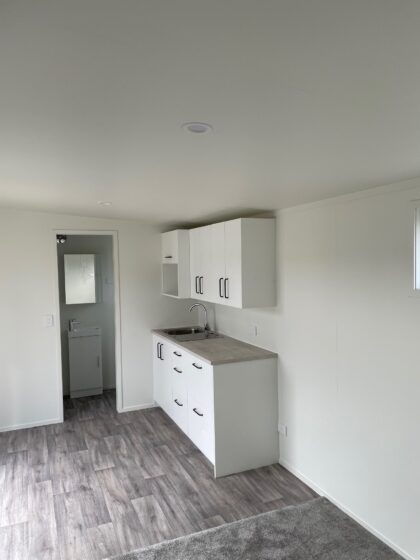 Self-contained cabin kitchenette bathroom